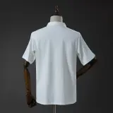 Polo Mercedes AMG Fórmula 1 2026 Blanco con Ribete Verde Agua Hombre