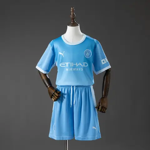 Conjunto Manchester City Primera Equipación 26/27 Niños