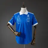 Polo Mercedes AMG Fórmula 1 2026 Azul con Cuello Blanco Hombre