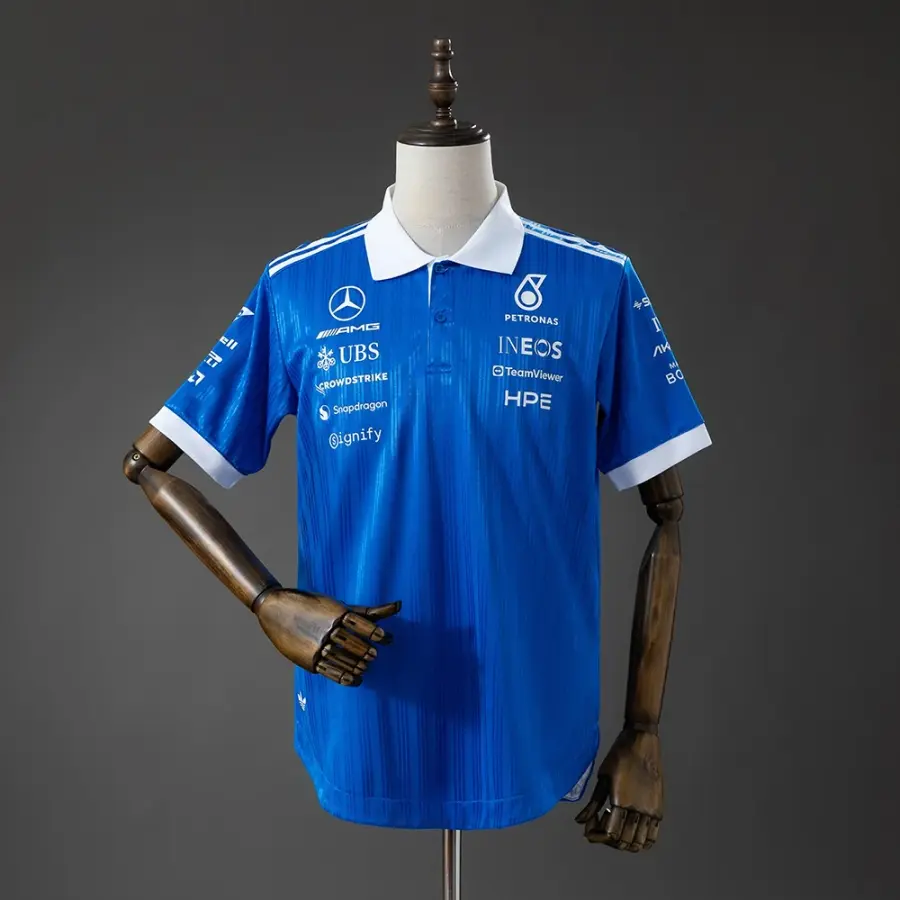 Polo Mercedes AMG Fórmula 1 2026 Azul con Cuello Blanco Hombre