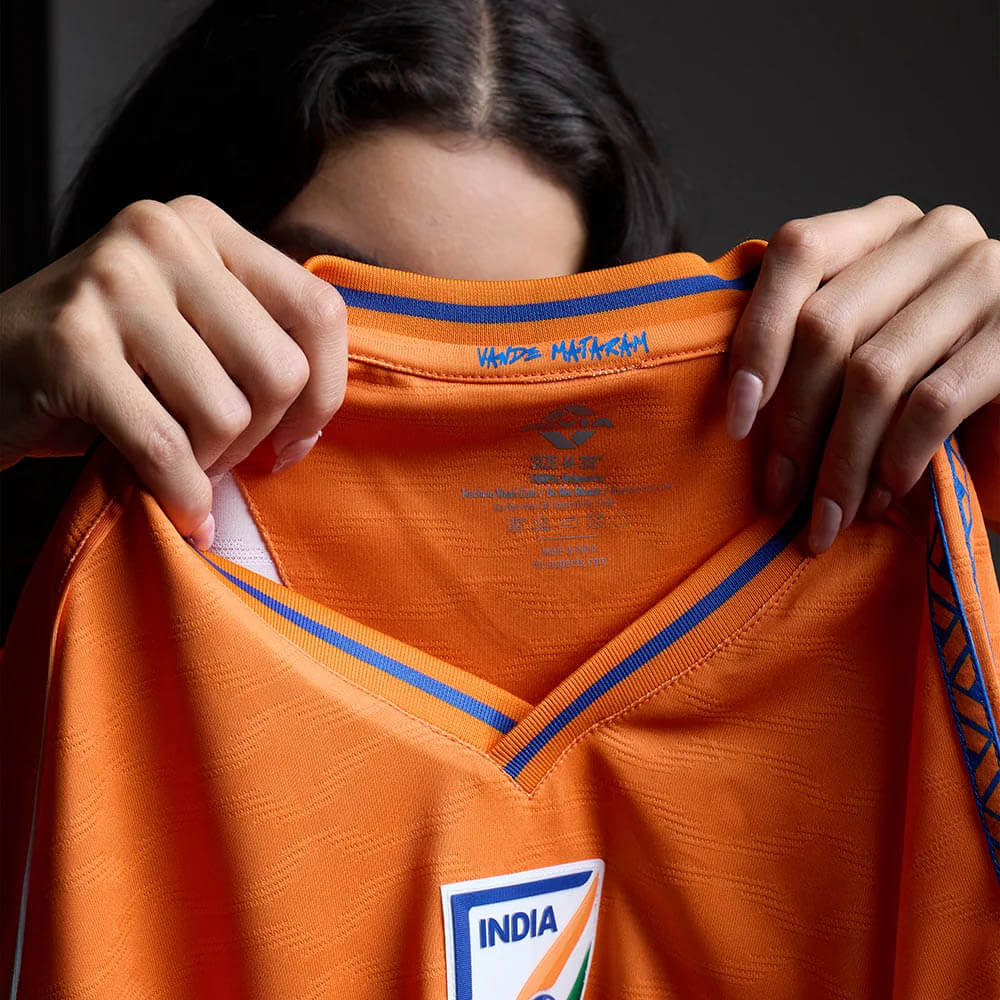 India 2026/27, orange shirt — 11