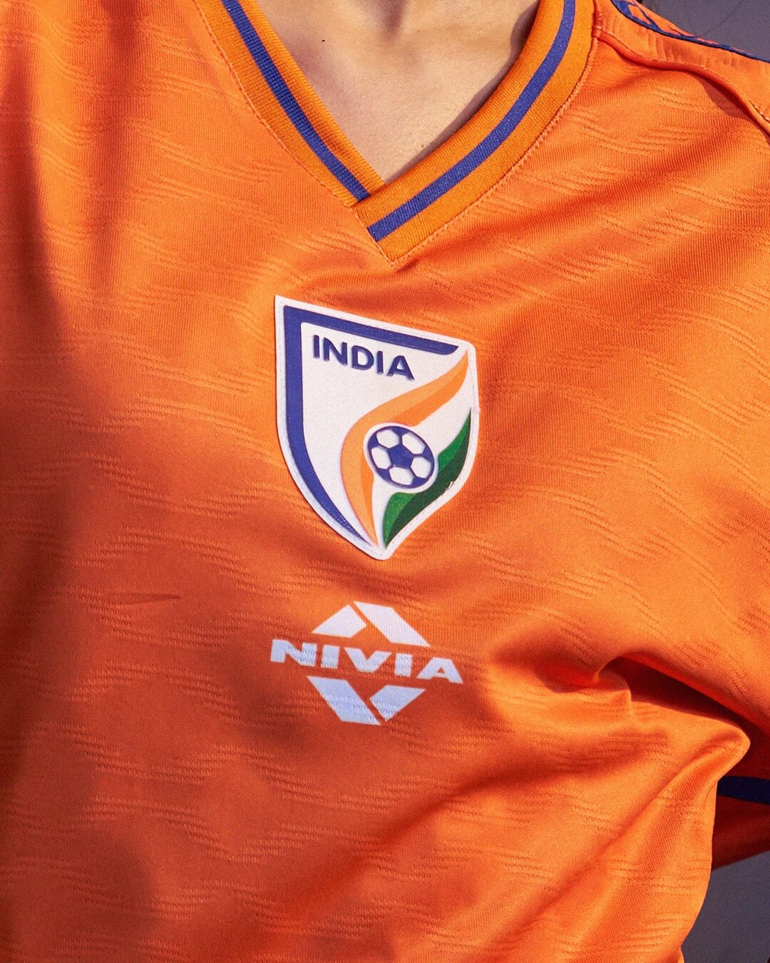 India 2026/27, orange shirt — 9