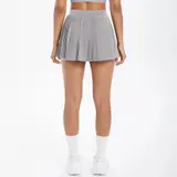 Volupie Court Pleated Skirt | Falda Plisada Deportiva con Short Interior y Bolsillo