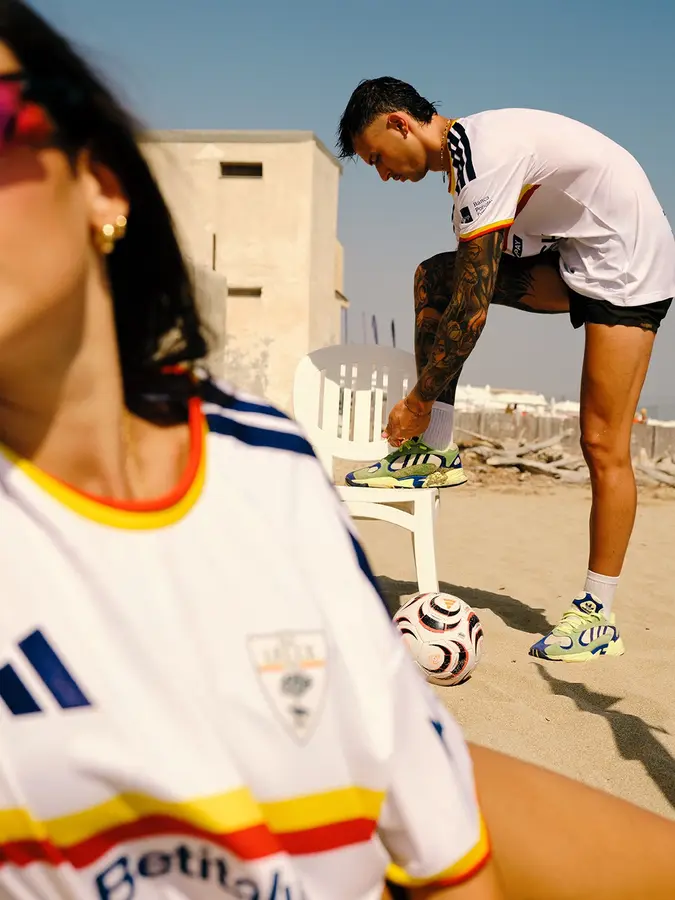 Lecce 2026/27: red and yellow across a white away shirt · 3