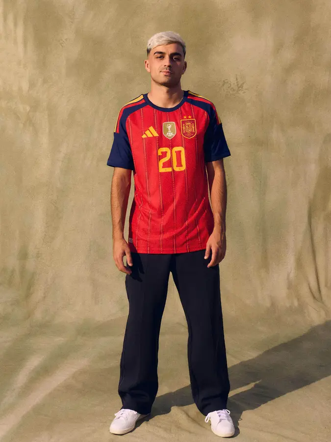 Spain: two stars and a gold patch on the red shirt · 7