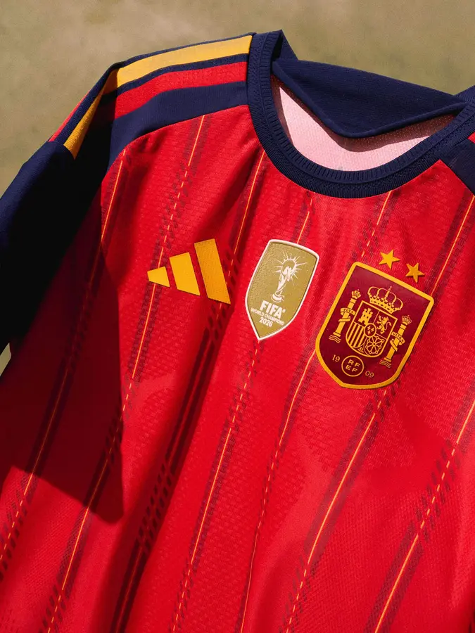 Spain: two stars and a gold patch on the red shirt · 4