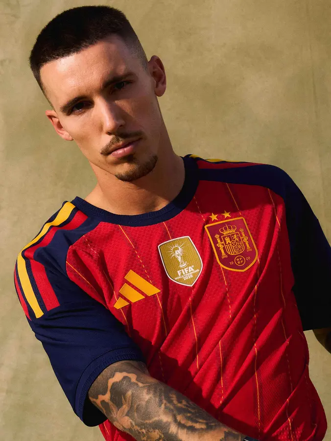 Spain: two stars and a gold patch on the red shirt · 3